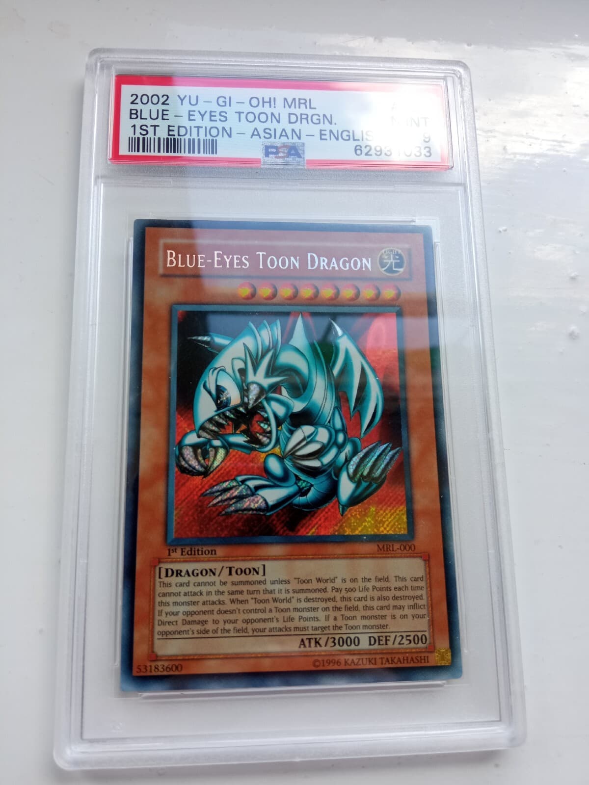 Yu-Gi-Oh Blue-Eyes Toon Dragon MRL-000 Secret Rare 1st Edition PSA 9 AE
